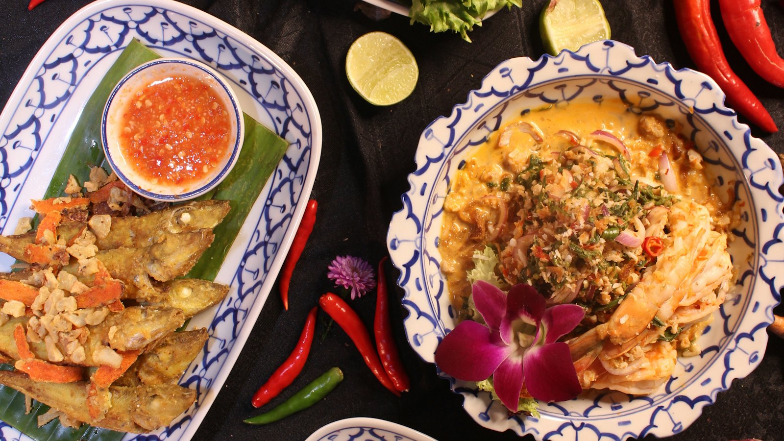 Thai dishes served on patterned plates