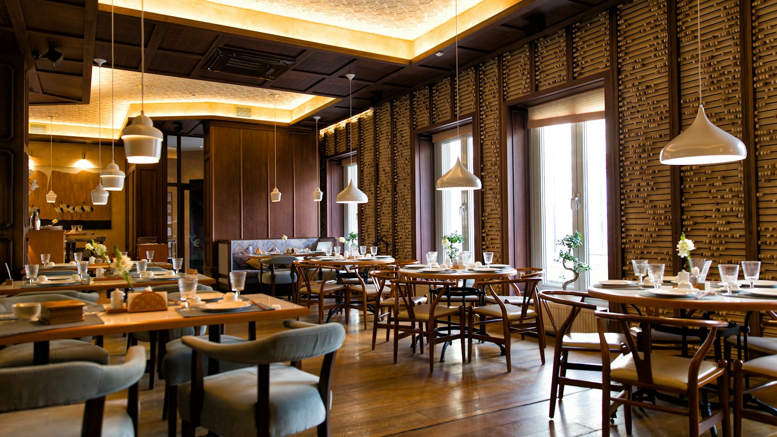 Restaurant dining room with set tables