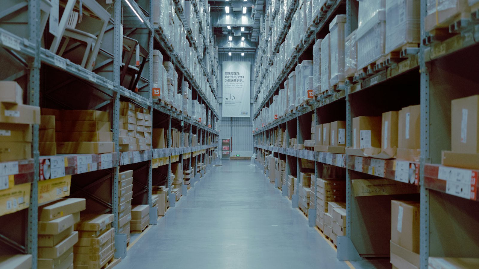 Warehouse aisle with stocked shelves
